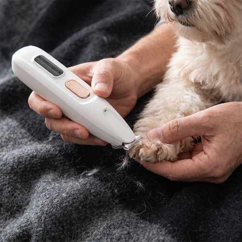 The Snuggle Snout™ Pet Paw Trimmer
